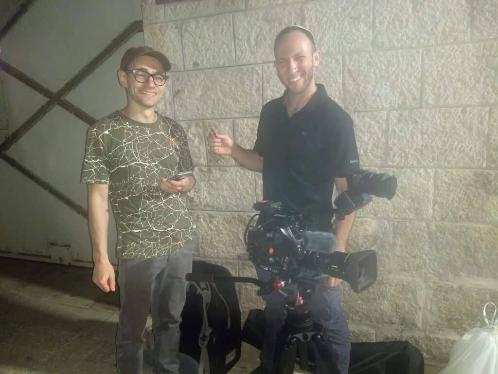Dimi and Zvi in the old city after many hours of filming